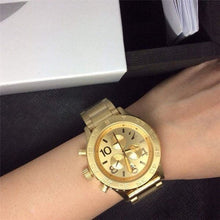 Load image into Gallery viewer, Nixon 42-20 Chrono Champagne Dial Gold Tone Men’s Watch
