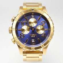 Load image into Gallery viewer, Nixon 48-20 Chrono Blue Dial Gold PVD Men’s Watch A486-1922
